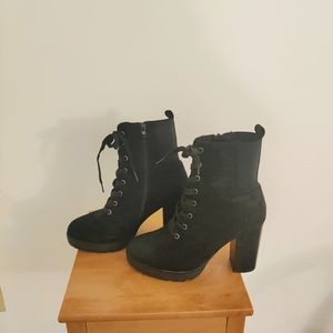 Black high heeled combat boots